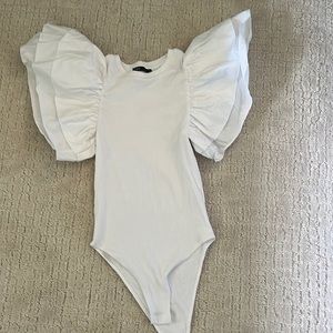 white ruffled zara bodysuit